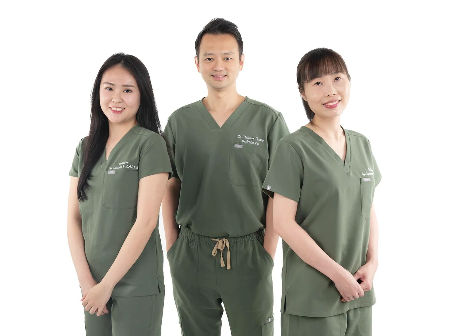 Medical professionals in green scrubs